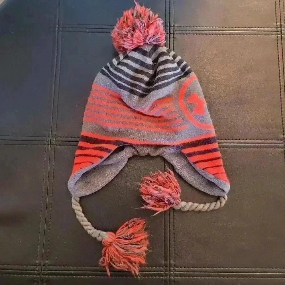 Under Armour Boy's Black/Gray/Red Acrylic Beanie w Ear Flaps, Tassles & Pom-Pom